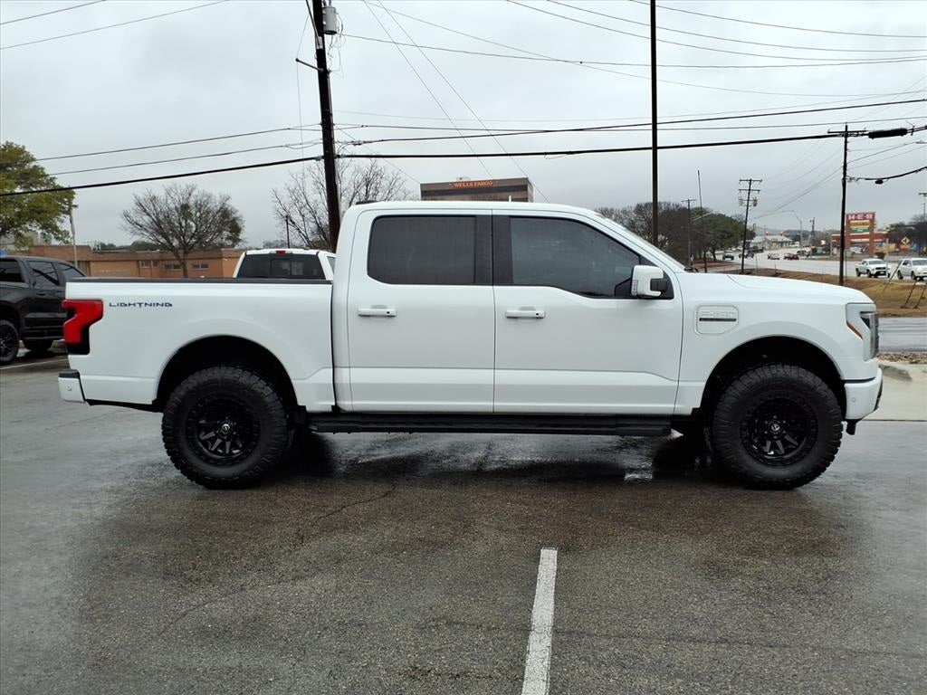 Used 2023 Ford F-150 Lightning Lariat with VIN 1FT6W1EV8PWG59261 for sale in Kerrville, TX